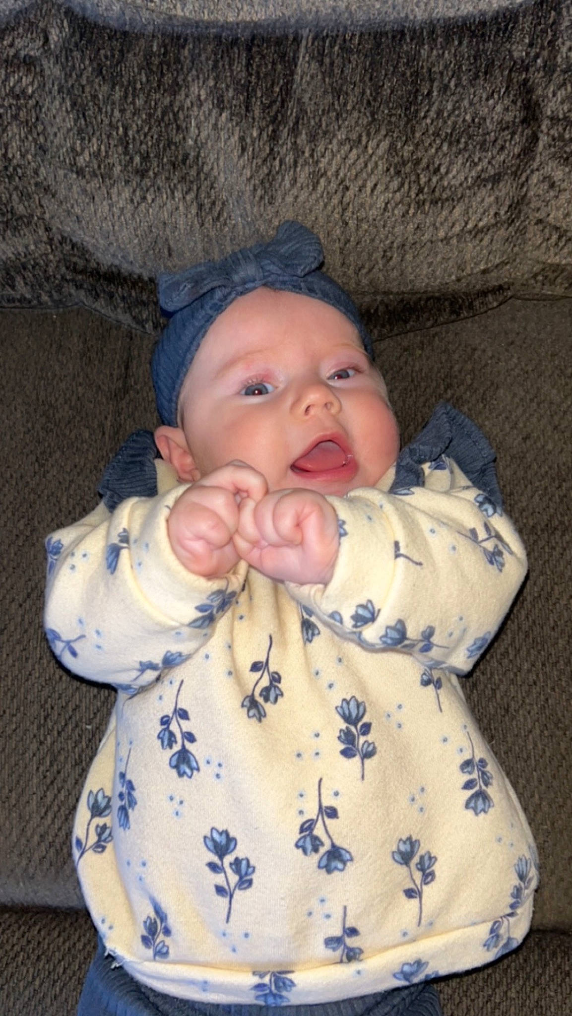 J.l.d is registered to the contest to win money with this photo: baby, baby_toddler_clothing, cheek, child, comfort, eye, finger, gesture, head, human_body, iris, lip, mouth, nose, pattern, person, sitting, skin, sleeve, thumb