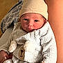 newborn, baby, infant, hat, onesie, bear_face, hand, legs, blanket, indoor, cozy, cute, soft, person, clothing, skin, portrait, baby_clothes, holding, warm