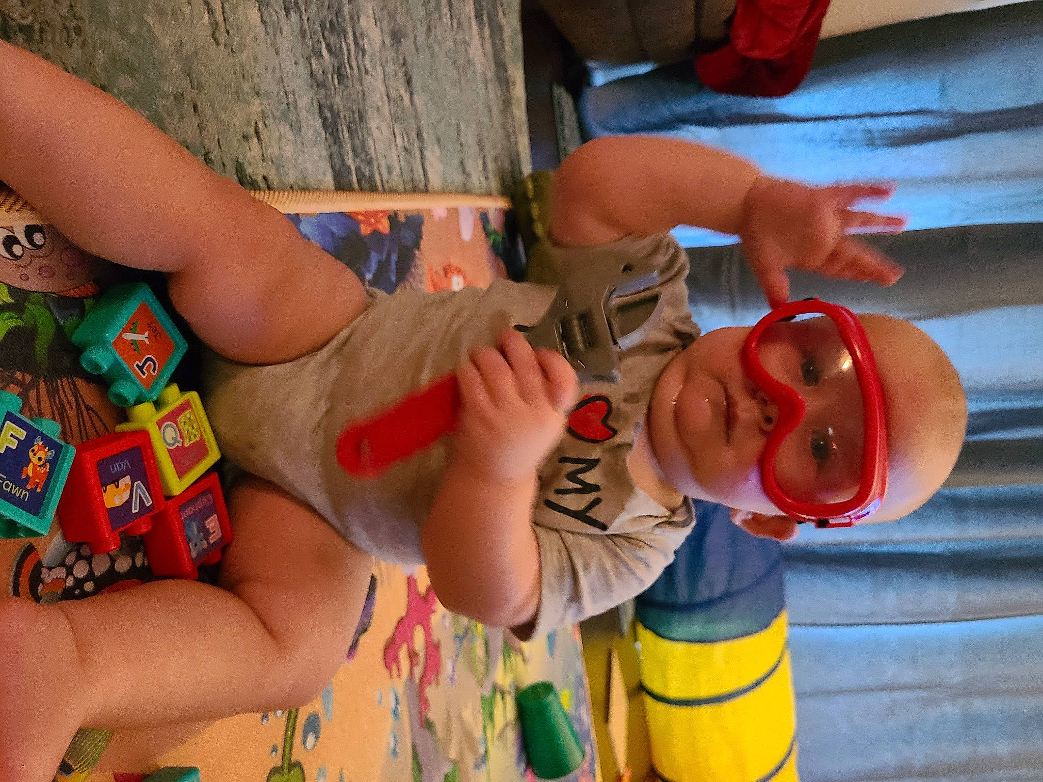 Aspen joined the competition — help win amazing prizes! arm, elbow, finger, fun, hand, happy, human, human_body, joint, leisure, mouth, muscle, orange, people, person, red, shorts, summer, thigh, toddler