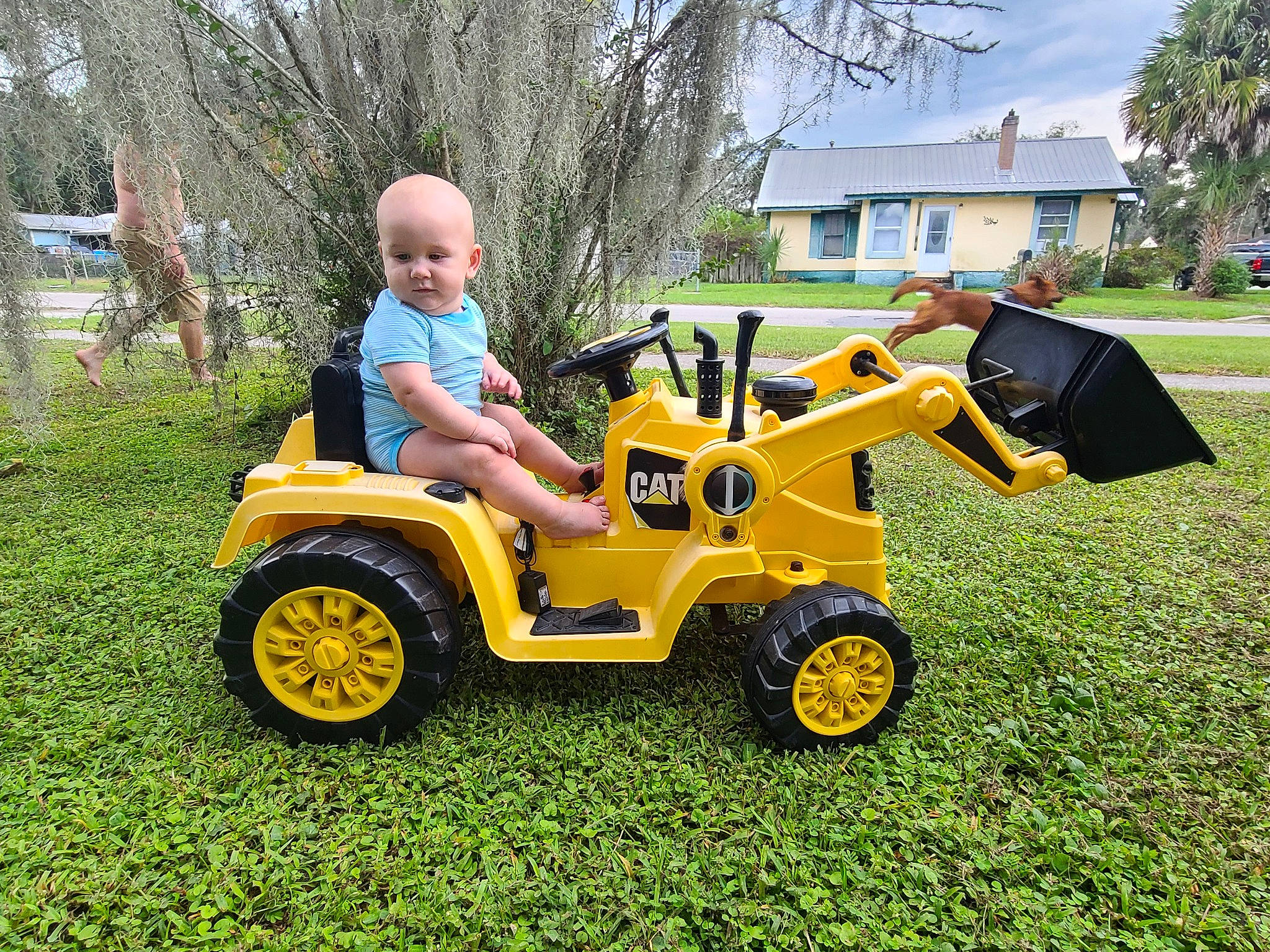 Aspen joined the competition — help win amazing prizes! auto_part, automotive_exterior, automotive_tire, automotive_wheel_system, fender, fun, grass, lawn, motor_vehicle, person, plant, riding_toy, sky, t_shirt, tire, toddler, tread, tree, vehicle, wheel