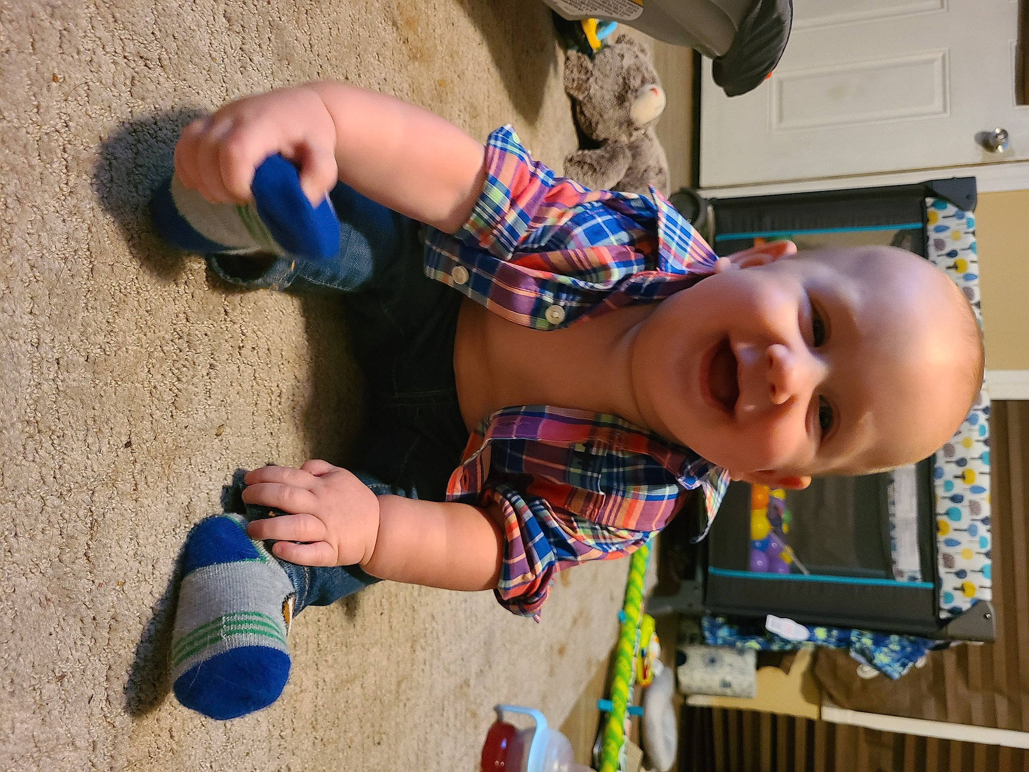 Aspen is registered to the contest to win money with this photo: baby, baby_toddler_clothing, blue, child, electric_blue, finger, fun, hand, happy, human_leg, leisure, nail, person, play, shelf, smile, soil, toddler, toy, vacation