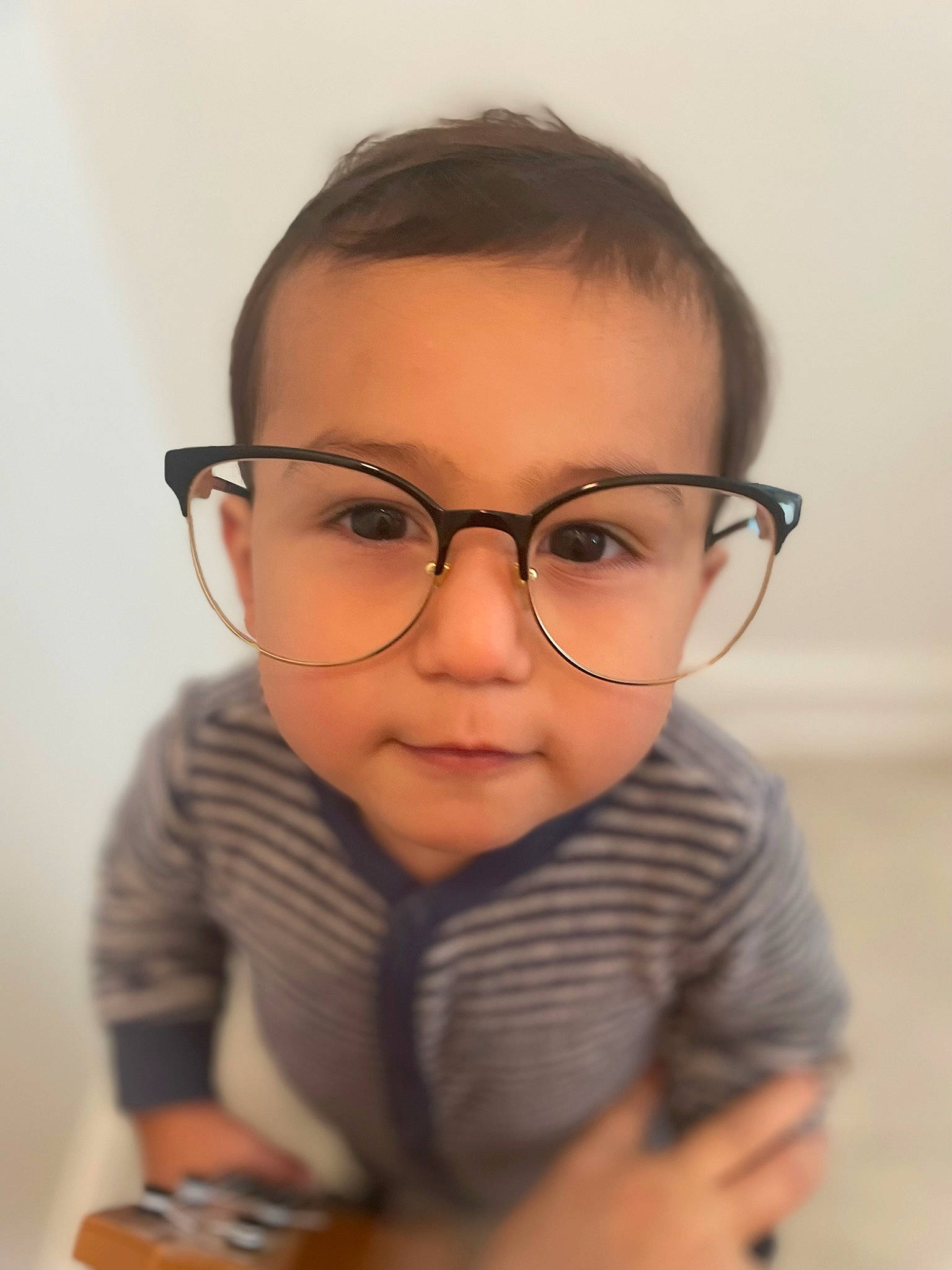 Bryce joined the competition — help win amazing prizes! baby_toddler_clothing, cheek, eyelash, eyewear, flash_photography, forehead, fun, gesture, glasses, hair, happy, nose, person, personal_protective_equipment, shoulder, sitting, sleeve, thumb, toddler, vision_care