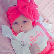Savannah is registered to the contest to win money with this photo: adorable, baby, baby_girl, blanket, child, close_up, cute, face, hand, headband, indoors, infant, lying_down, pink_bow, pink_clothing, portrait, small_hands, soft_texture, white_clothing, young
