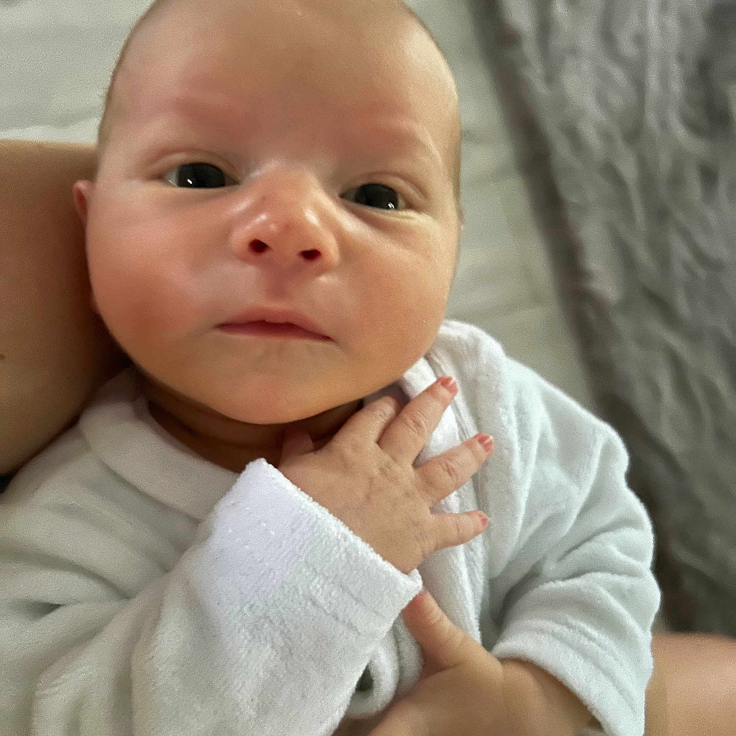 Ayden participe au concours pour gagner de l'argent avec cette photo : accessories, baby, blanket, bodypart, face, finger, hand, happy, head, jewelry, newborn, person, photography, portrait, ring, smile, towel, wrist