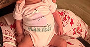 Soul joined the competition — help win amazing prizes! newborn, baby, sleeping, onesie, pink_clothing, hand, blanket, pattern, floor, person, infant, cute, cozy, soft_lighting, indoors, footwear, socks, tattoo, rest, peaceful