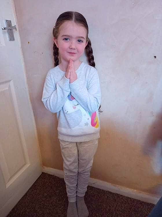Orla is registered to the contest to win money with this photo: baby_toddler_clothing, door, dress_shirt, face, flooring, gesture, hair, head, iris, joint, knee, long_hair, neck, person, shoulder, skin, sleeve, smile, t_shirt, waist