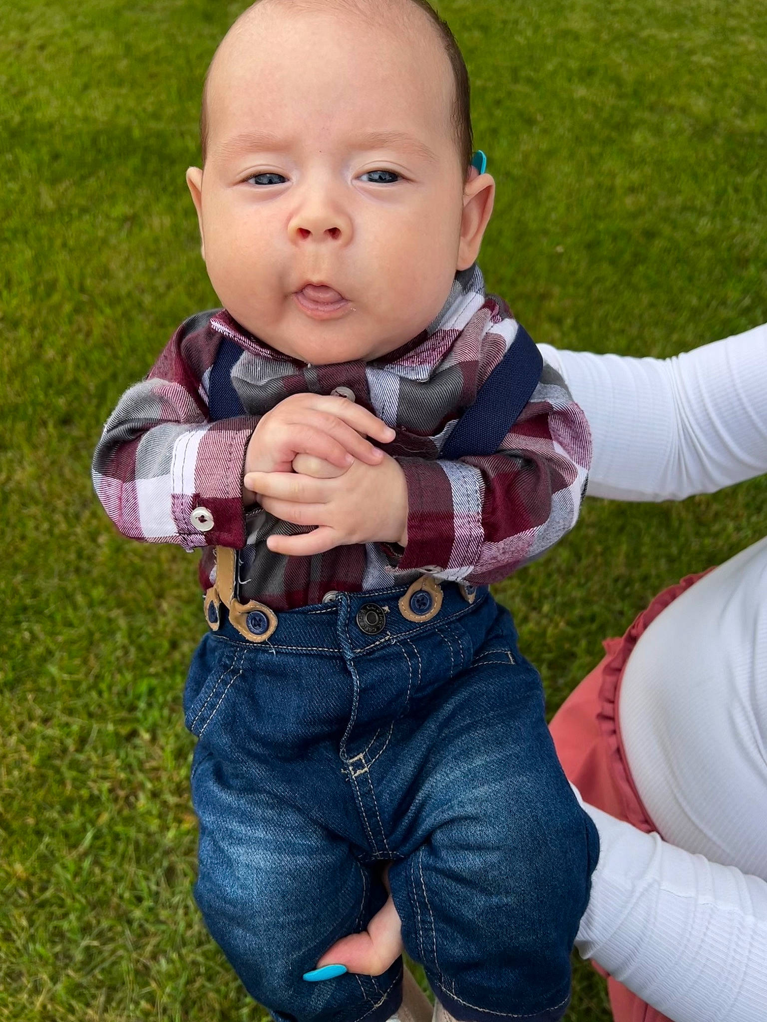 Jasiah is registered to the contest to win money with this photo: baby, baby_toddler_clothing, child, finger, fun, gesture, grass, hand, happy, jeans, nose, outerwear, pattern, people_in_nature, person, plant, sitting, sleeve, t_shirt, thumb