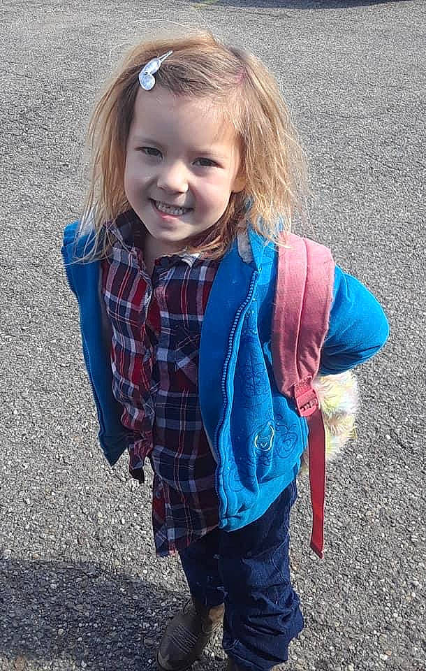 Dani is registered to the contest to win money with this photo: child, child_model, design, electric_blue, jacket, joy, long_hair, outerwear, pattern, person, plaid, play, scarf, smile, tartan, textile, toddler