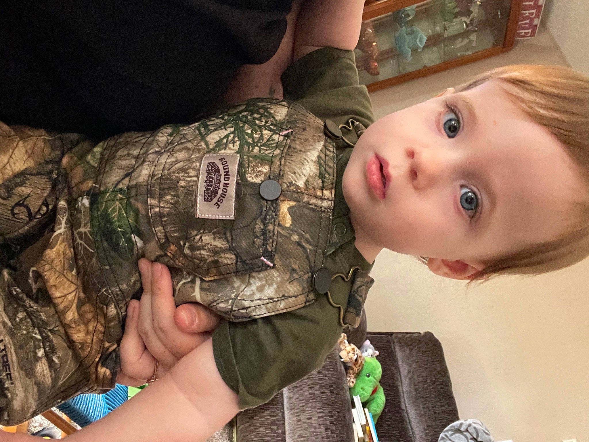 Rhys joined the competition — help win amazing prizes! camouflage, chest, child, eyelash, flash_photography, fun, green, happy, human_body, military_camouflage, military_person, military_uniform, nail, neck, pattern, person, sitting, skin, sleeve, toddler