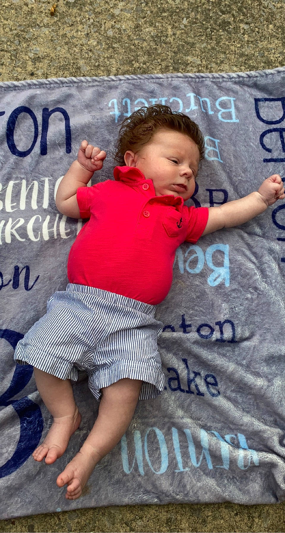 Benton is registered to the contest to win money with this photo: barefoot, child, cool, facial_expression, font, foot, fun, happy, human_leg, leisure, pattern, person, pink, play, product, shorts, sleeve, summer, t_shirt, textile