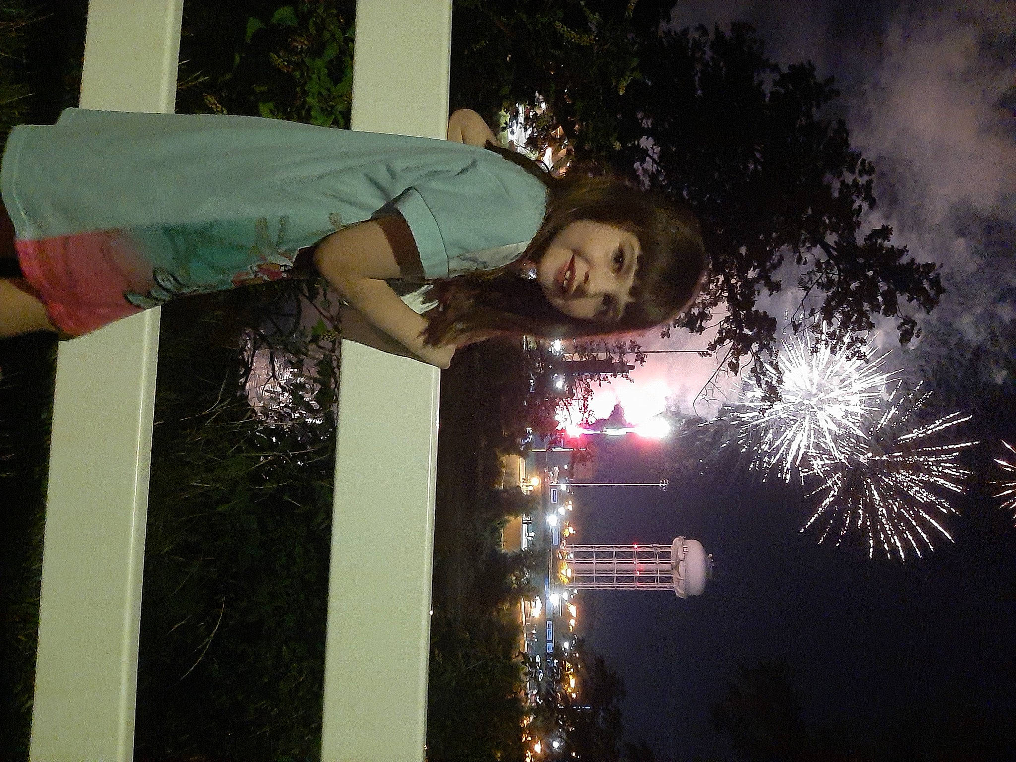 Kaila is registered to the contest to win money with this photo: darkness, diwali, electric_blue, event, festival, fireworks, flash_photography, fun, happy, holiday, joy, midnight, new_year, new_years_day, new_years_eve, night, person, pink, recreation, sky