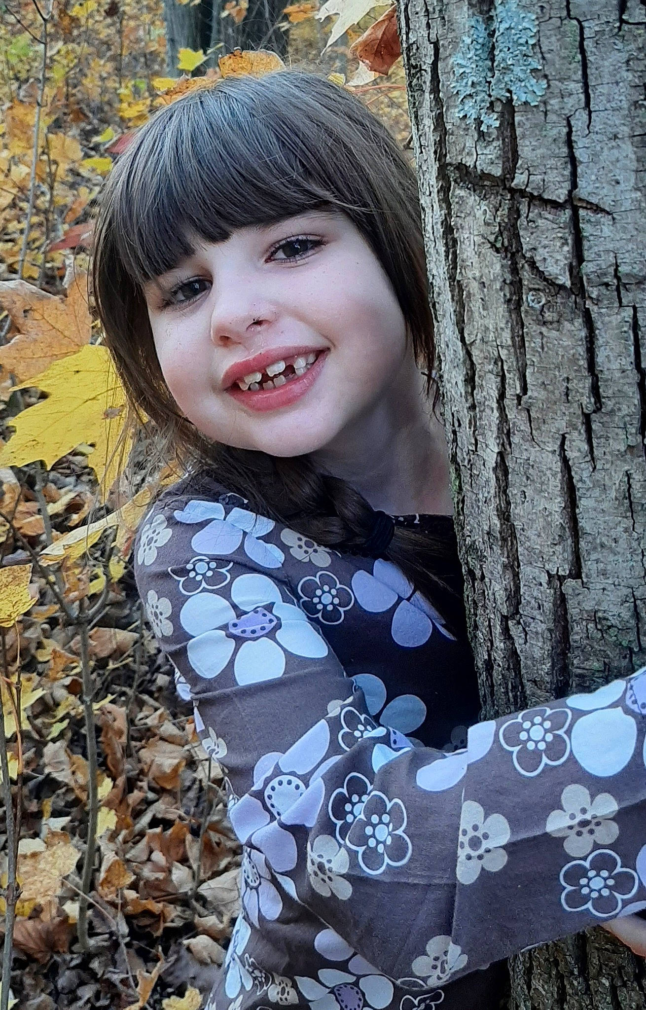 Kaila joined the competition — help win amazing prizes! bangs, black_hair, eye, face, grass, happy, head, joy, leaf, lip, organ, pattern, people_in_nature, person, plant, sleeve, smile, street_fashion, t_shirt, tree