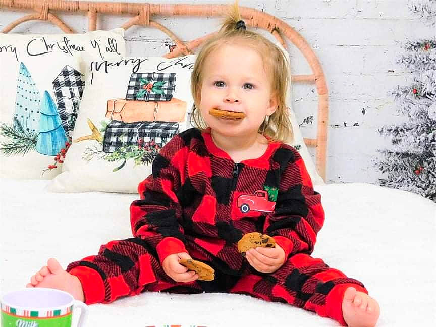 Mila is registered to the contest to win money with this photo: arthropod, baby_toddler_clothing, butterfly, child, clothing, event, fun, happy, head, insect, joy, moths_and_butterflies, pattern, person, pink, plant, pollinator, sitting, skin, sleeve