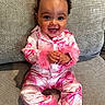 baby, bows, child, clothing, couch, cute, fabric, face, feathers, hands, happy, indoor, infant, pajamas, pink, portrait, sitting, smile, texture, young_child