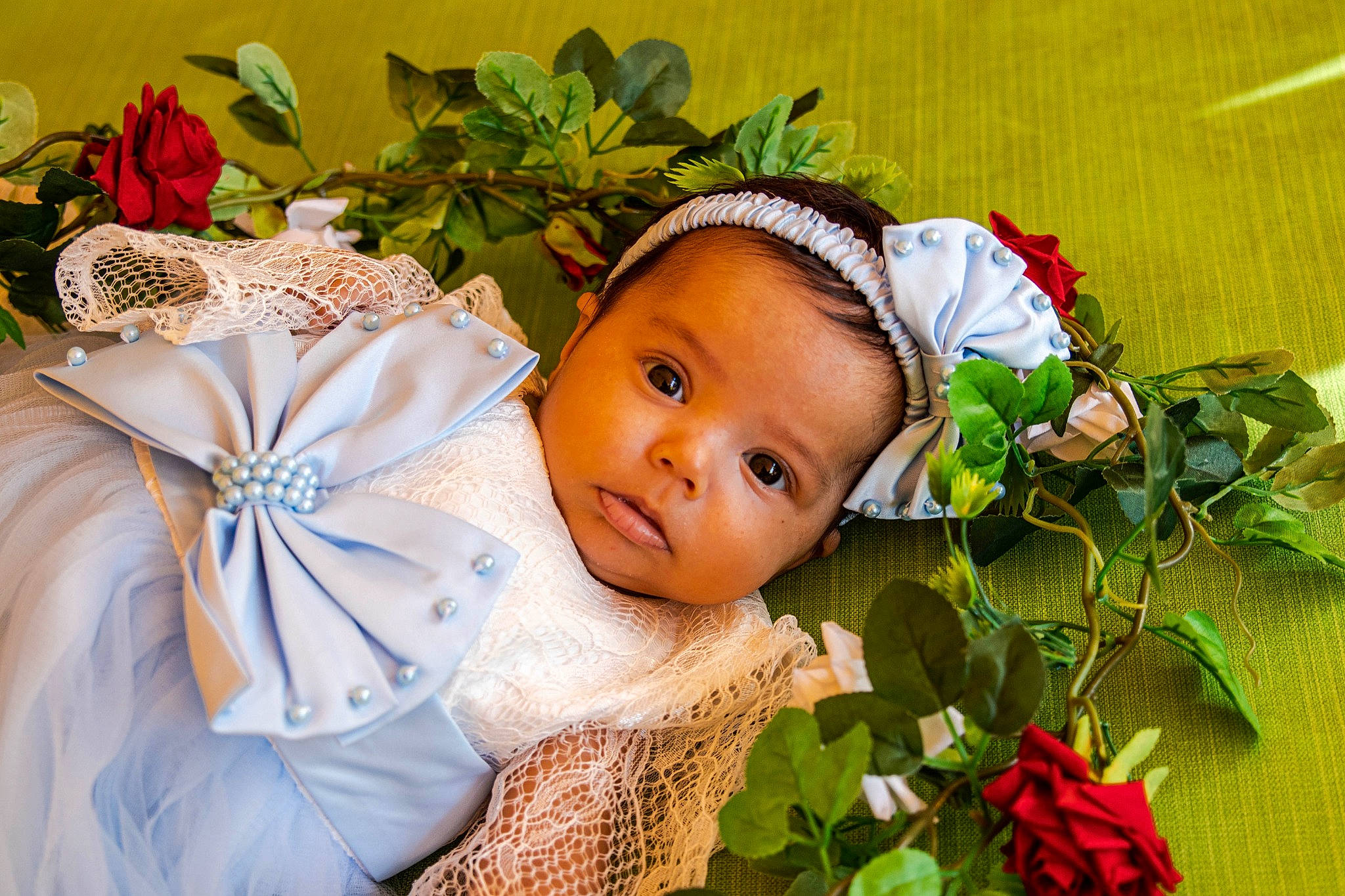 Athéna participe au concours pour gagner de l'argent avec cette photo : beauty, botany, child, dress, facial_expression, flower, flower_arranging, grass, happy, headband, headgear, headpiece, iris, leaf, nature, people_in_nature, person, petal, pink, plant