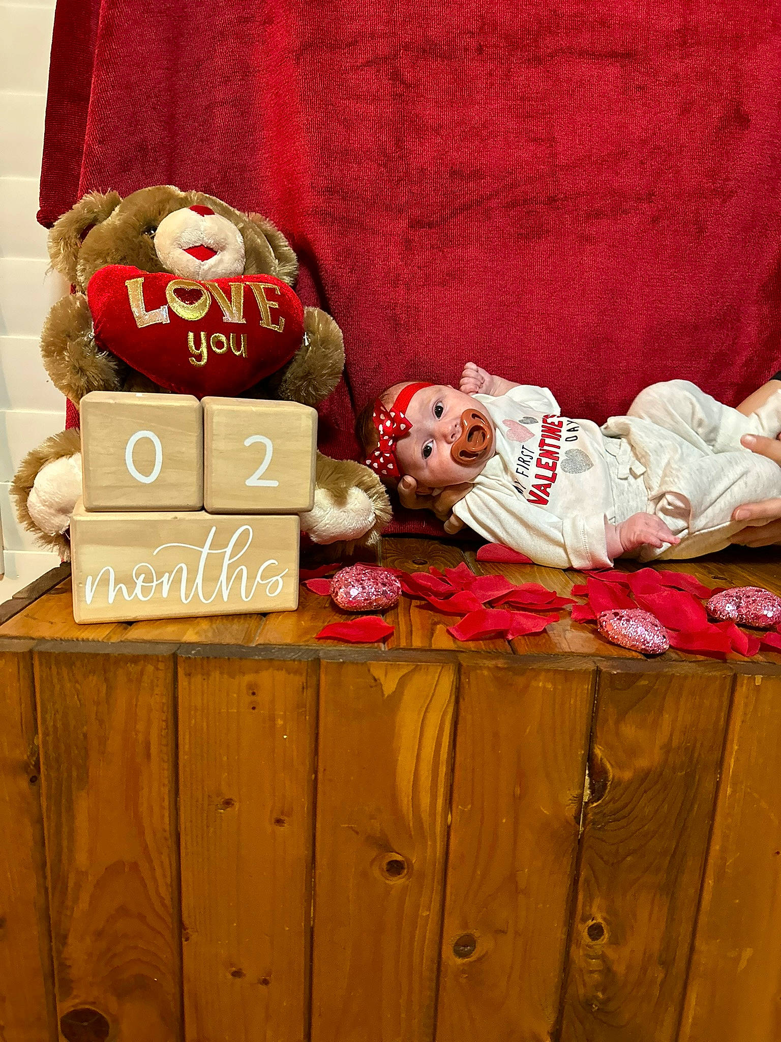 Shania joined the competition — help win amazing prizes! box, cabinetry, carmine, carton, chest_of_drawers, child, cupboard, drawer, event, hardwood, linens, person, product, red, room, shipping_box, stuffed_toy, teddy_bear, textile, toy