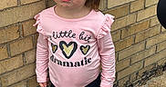 Elaina joined the competition — help win amazing prizes! child, toddler, girl, portrait, standing, pouting, serious_expression, ponytail, pink_shirt, ruffles, hearts, black_pants, yellow_shoes, brick_wall, sidewalk, outdoor, daylight, fashion, full_body, humorous