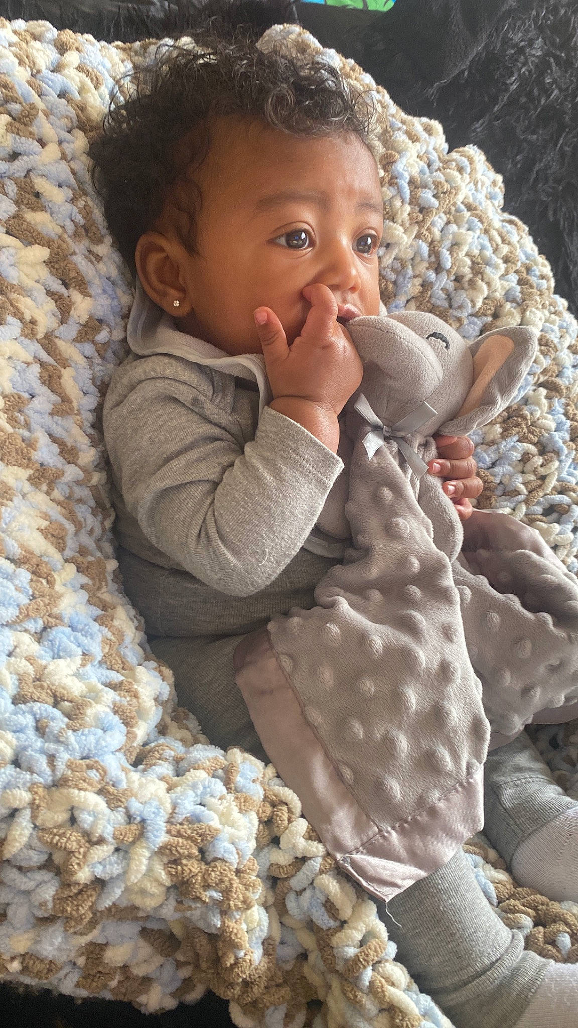 Kyree is registered to the contest to win money with this photo: baby_toddler_clothing, cheek, chin, eye, face, gesture, hair, hand, head, human, iris, lip, nose, organ, people_in_nature, person, photograph, product, skin, sleeve