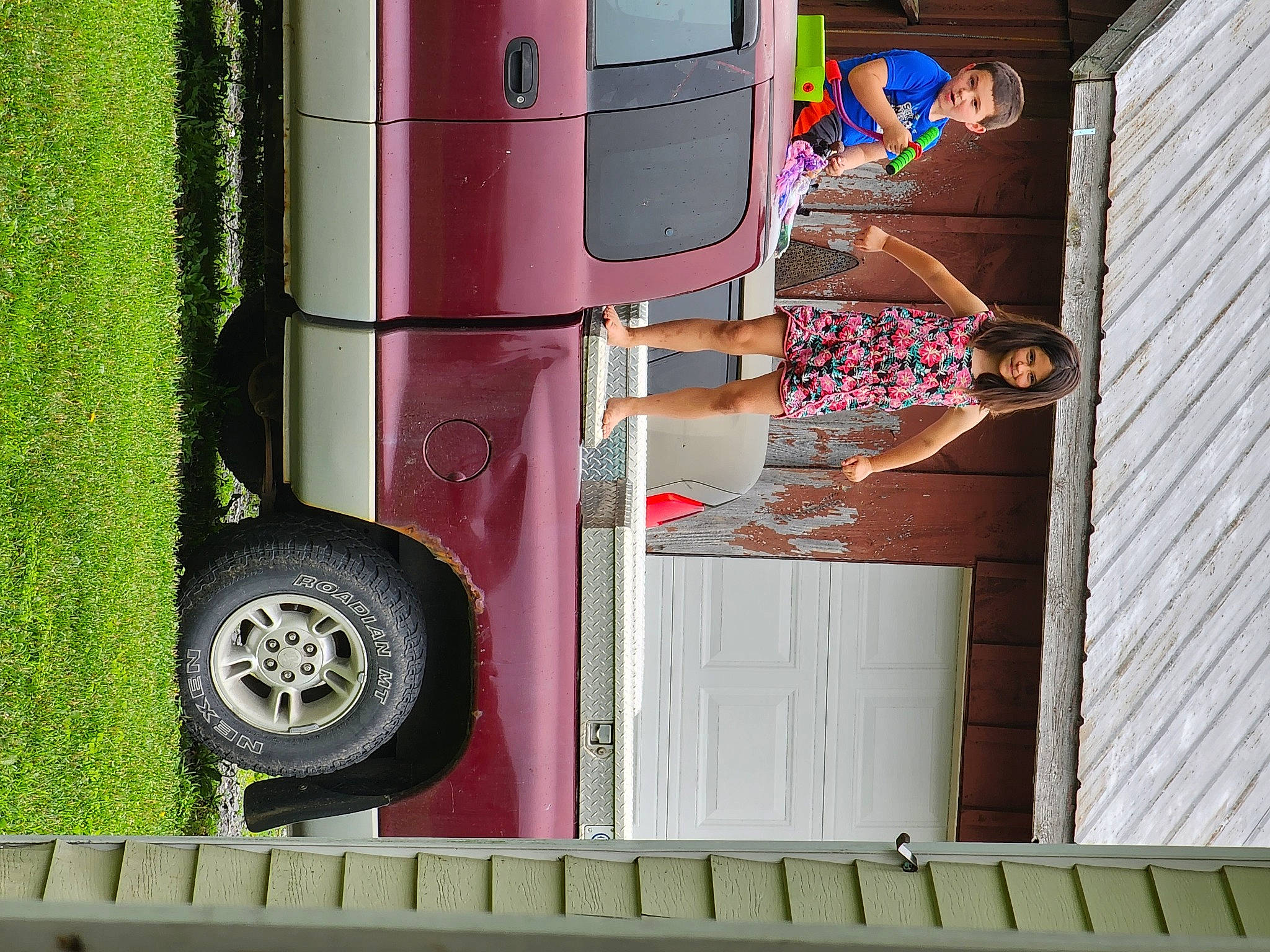 Emma Lynn is registered to the contest to win money with this photo: automotive_design, automotive_exterior, automotive_tire, automotive_wheel_system, building, bumper, car, door, fender, joy, land_vehicle, mode_of_transport, motor_vehicle, person, rolling, tire, tread, vehicle, vehicle_door, wheel