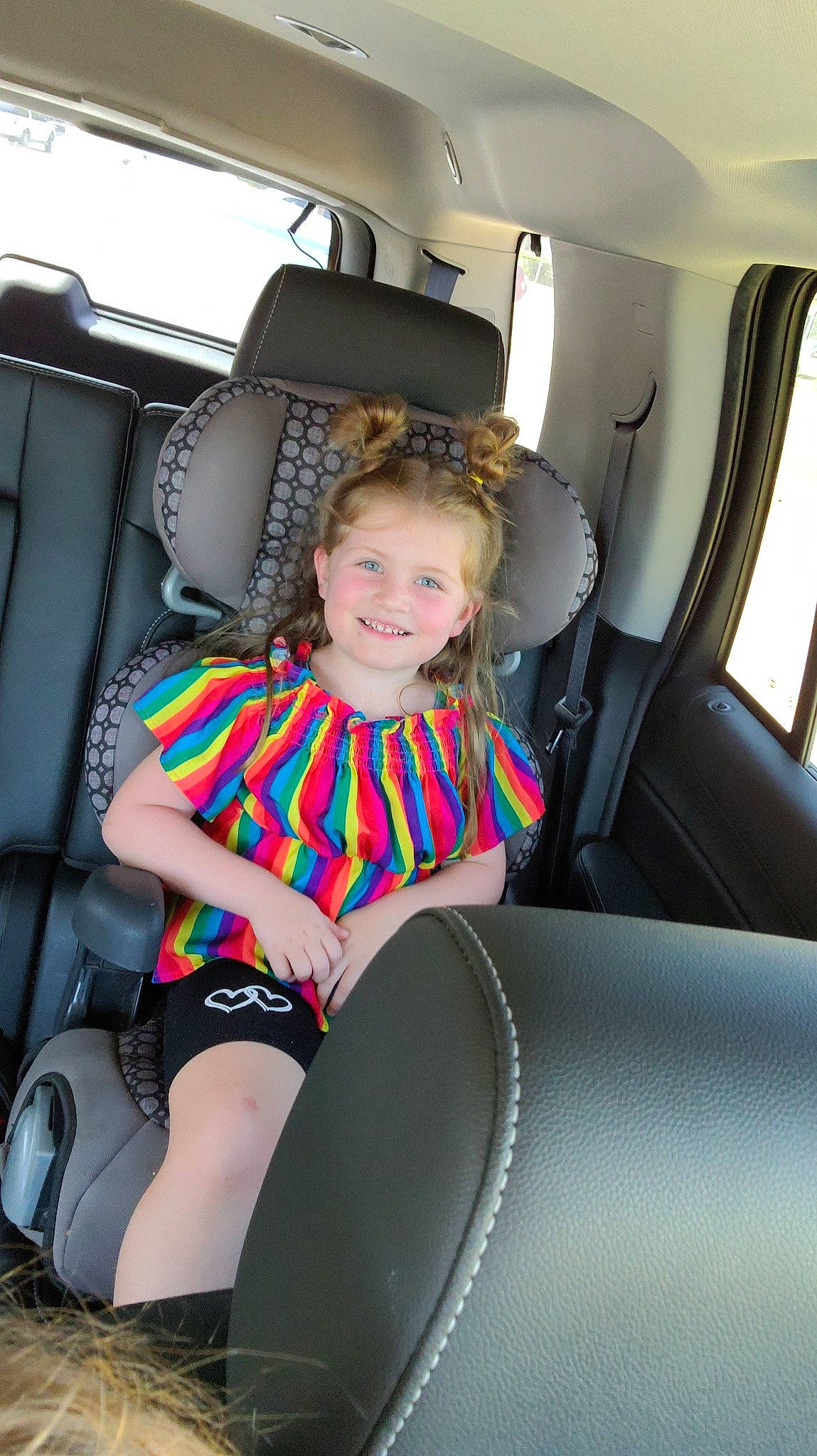 Emma Rogers is registered to the contest to win money with this photo: auto_part, automotive_design, automotive_exterior, car, car_seat, car_seat_cover, comfort, family_car, head_restraint, human_leg, joy, motor_vehicle, person, seat_belt, shorts, smile, steering_wheel, thigh, toddler, vehicle