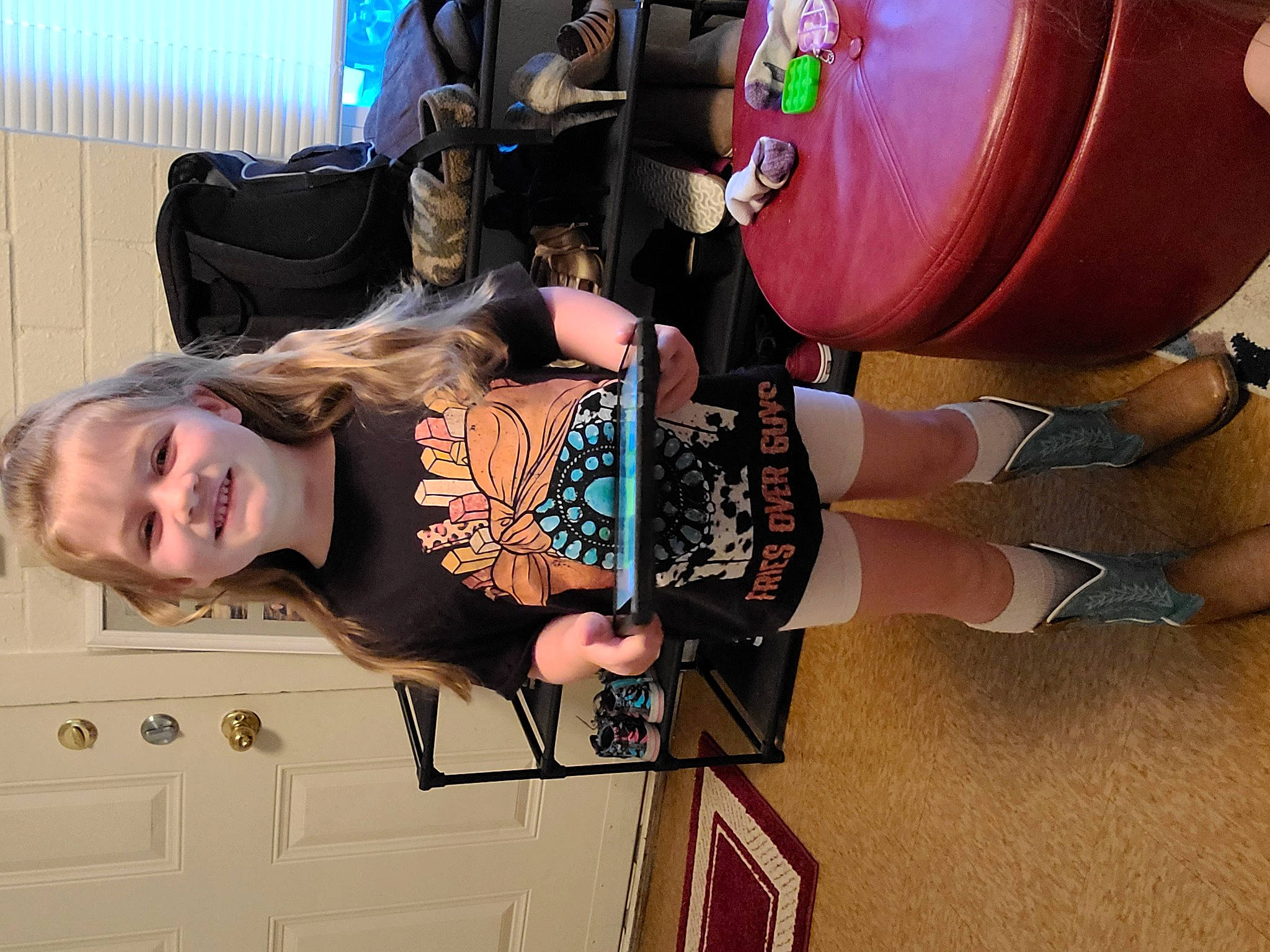 Emma Rogers is registered to the contest to win money with this photo: audio_equipment, drum, fedora, fun, hat, human_leg, idiophone, joy, membranophone, musical_instrument, person, room, shorts, smile, t_shirt, thigh, toddler