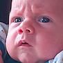 Malo participe au concours pour gagner de l'argent avec cette photo : baby, blanket, blue_clothing, cheeks, child, close_up, curious, expression, eyes, face, indoors, infant, mouth, newborn, nostrils, person, portrait, skin, soft_texture, wrinkled_forehead