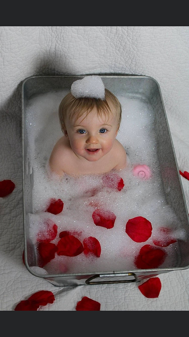 Callie joined the competition — help win amazing prizes! baby, baby_toddler_clothing, bathing, cheek, child, dress, fruit, hair, hand, head, lip, pattern, person, petal, pink, rose, smile, sweetness, tableware, toddler