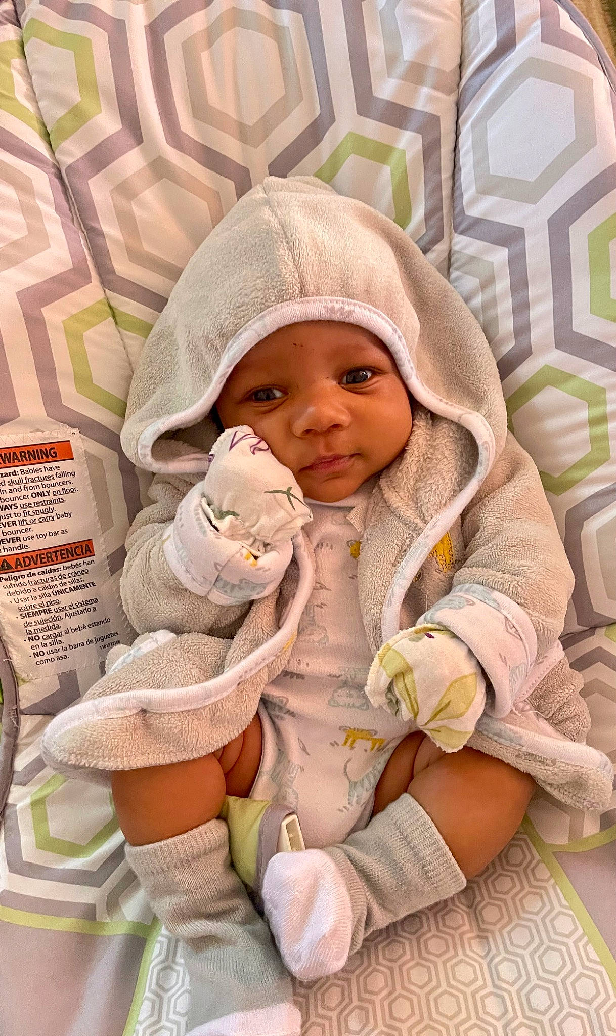 Sereno is registered to the contest to win money with this photo: baby, baby_products, baby_safety, baby_sleeping, baby_toddler_clothing, cheek, child, comfort, headwear, linens, pattern, peach, person, product, room, sitting, skin, sleeve, smile, textile