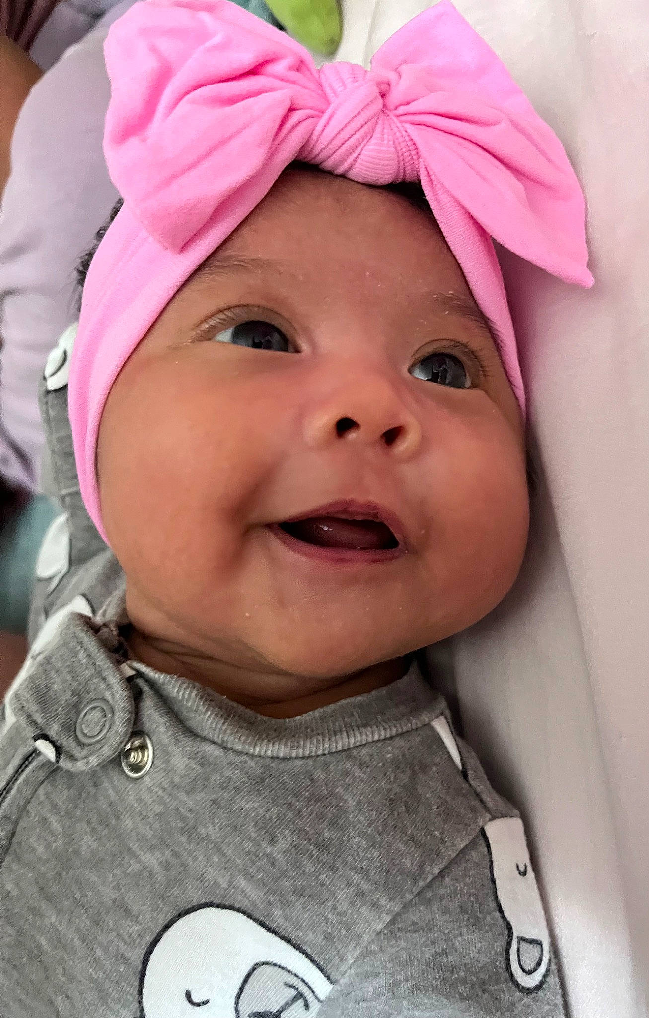 Emma joined the competition — help win amazing prizes! baby, cap, cheek, chin, cool, eye, face, facial_expression, happy, headwear, lip, mouth, nose, outerwear, person, pink, product, skin, sleeve, smile