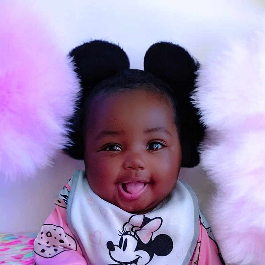 Pai'Linn joined the competition — help win amazing prizes! accessories, advertisement, baby, bodypart, bonnet, clothing, face, happy, hat, head, jewelry, mouth, necklace, people, person, photography, portrait, poster, purple, toy