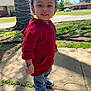 Zaelyn is registered to the contest to win money with this photo: child, toddler, curly_hair, red_hoodie, jeans, sneakers, sidewalk, sunlight, tattoo, outdoor, tree, grass, suburban, residential_area, smiling, person, daytime, casual_clothing, shadow, nature