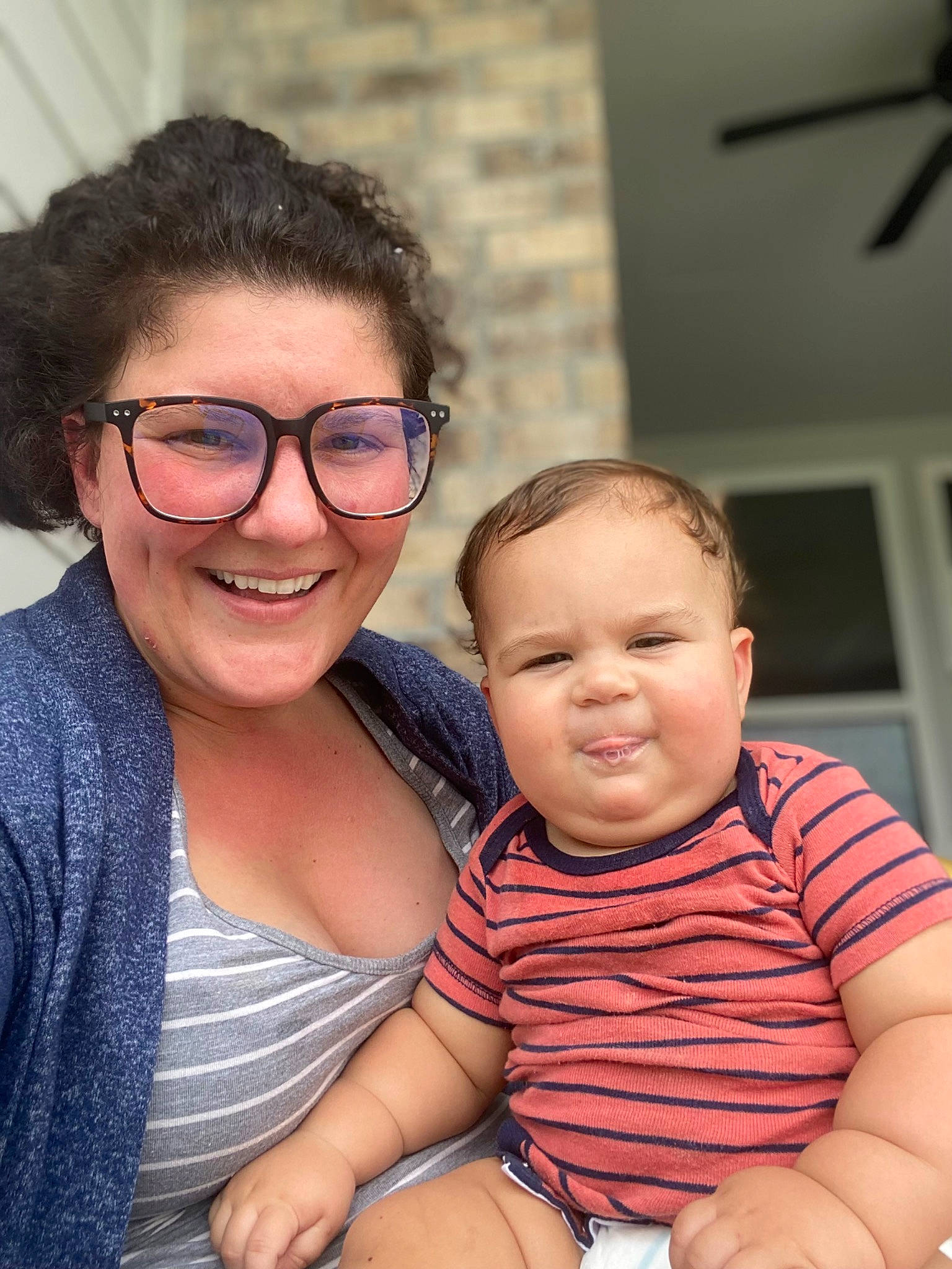 Gage is registered to the contest to win money with this photo: baby, baby_toddler_clothing, cheek, chin, clothing, event, eyewear, face, fun, glasses, hairstyle, happy, interaction, iris, joy, mouth, person, skin, smile, t_shirt