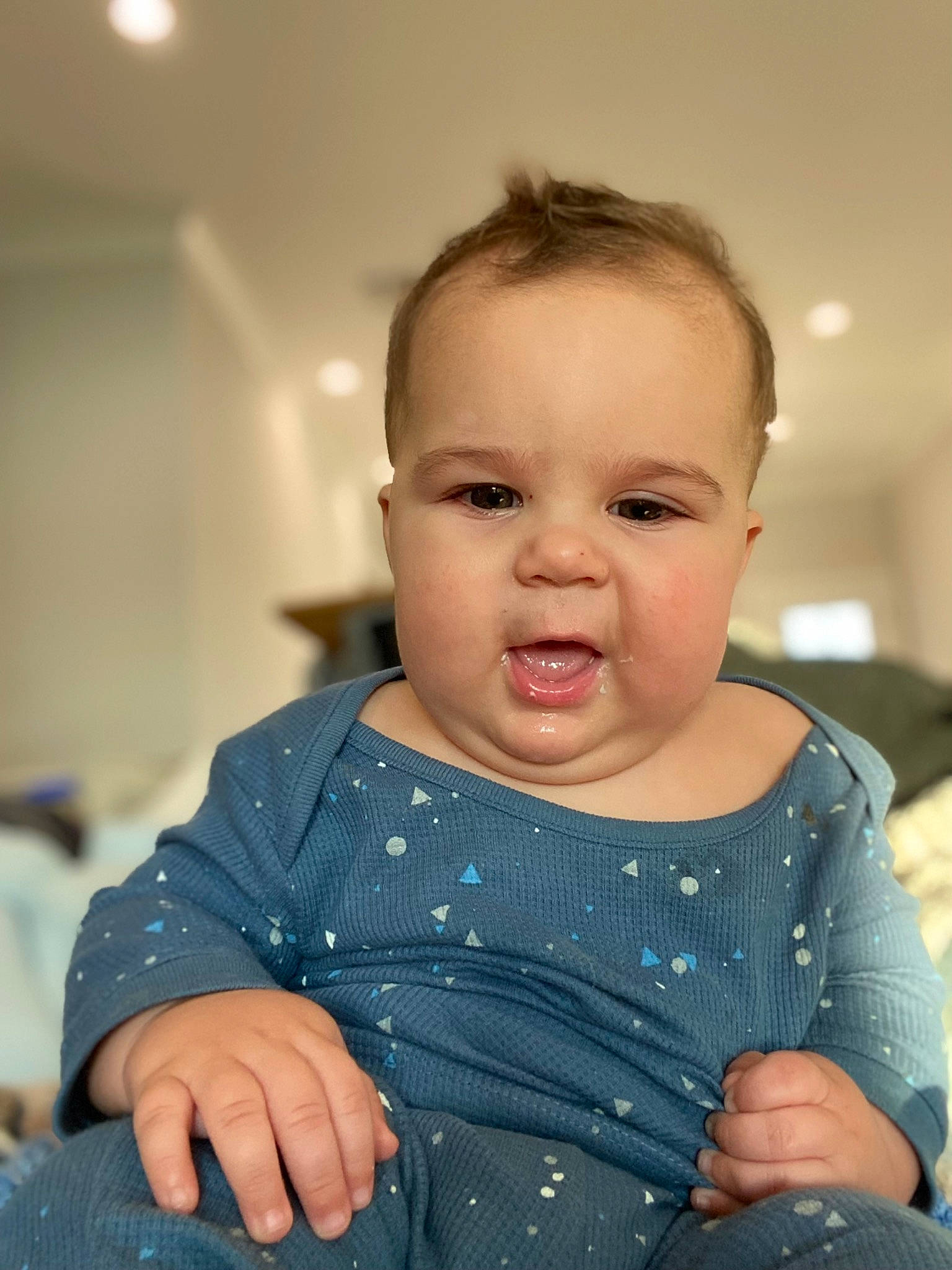 Gage joined the competition — help win amazing prizes! baby, baby_toddler_clothing, cheek, chin, collar, eye, eyelash, finger, flash_photography, gesture, happy, head, iris, lip, nose, person, sitting, skin, sleeve, smile
