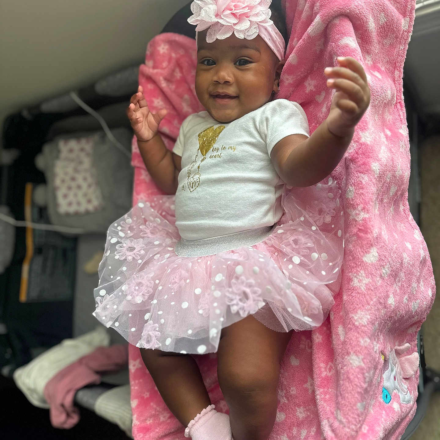 Sevyn is registered to the contest to win money with this photo: baby, bed, bedroom, blanket, bodypart, clothing, costume, dress, face, finger, furniture, hand, hat, head, indoors, person, photography, portrait, shorts, sitting