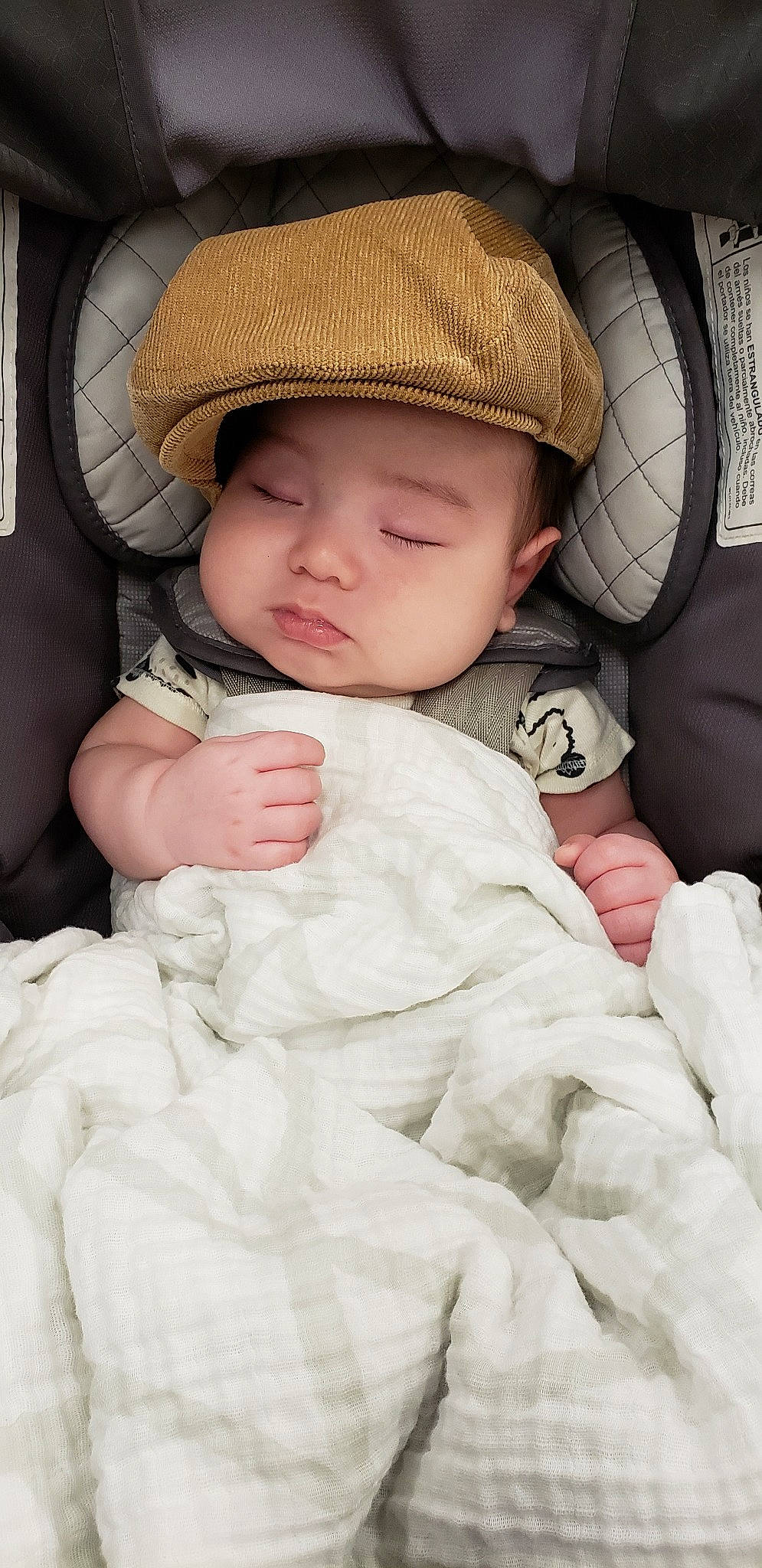 Cillian joined the competition — help win amazing prizes! baby, baby_carriage, baby_in_car_seat, baby_products, cheek, child, headwear, person, skin, sleep, toddler