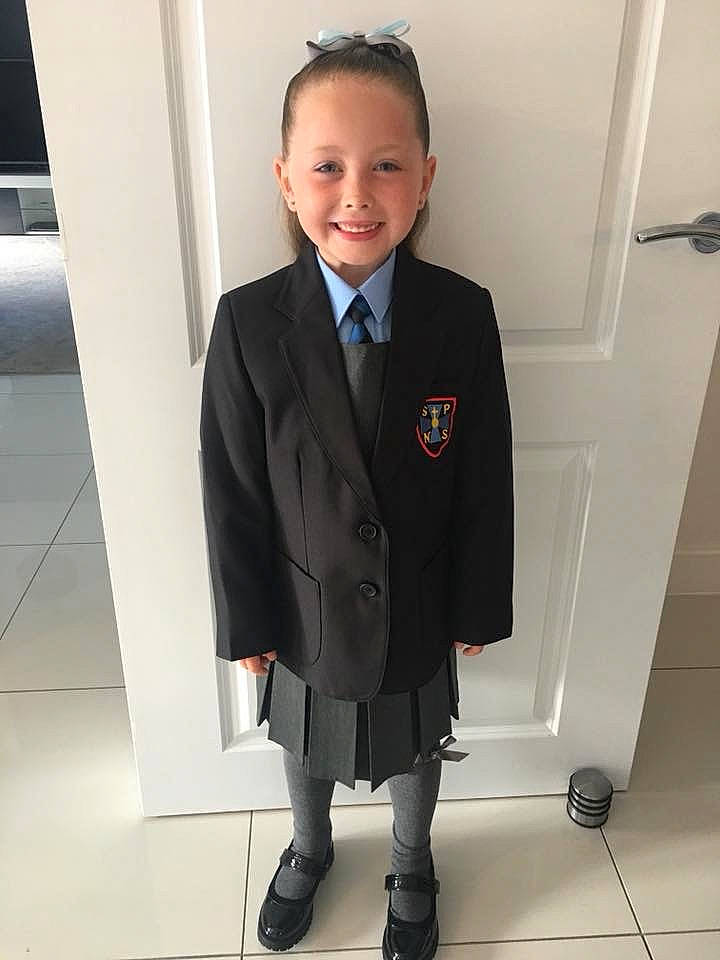 Sophie joined the competition — help win amazing prizes! blazer, businessperson, child, clothing, footwear, formal_wear, gentleman, jacket, joy, male, outerwear, person, school_uniform, smile, standing, suit, tie, tuxedo, uniform, white_collar_worker
