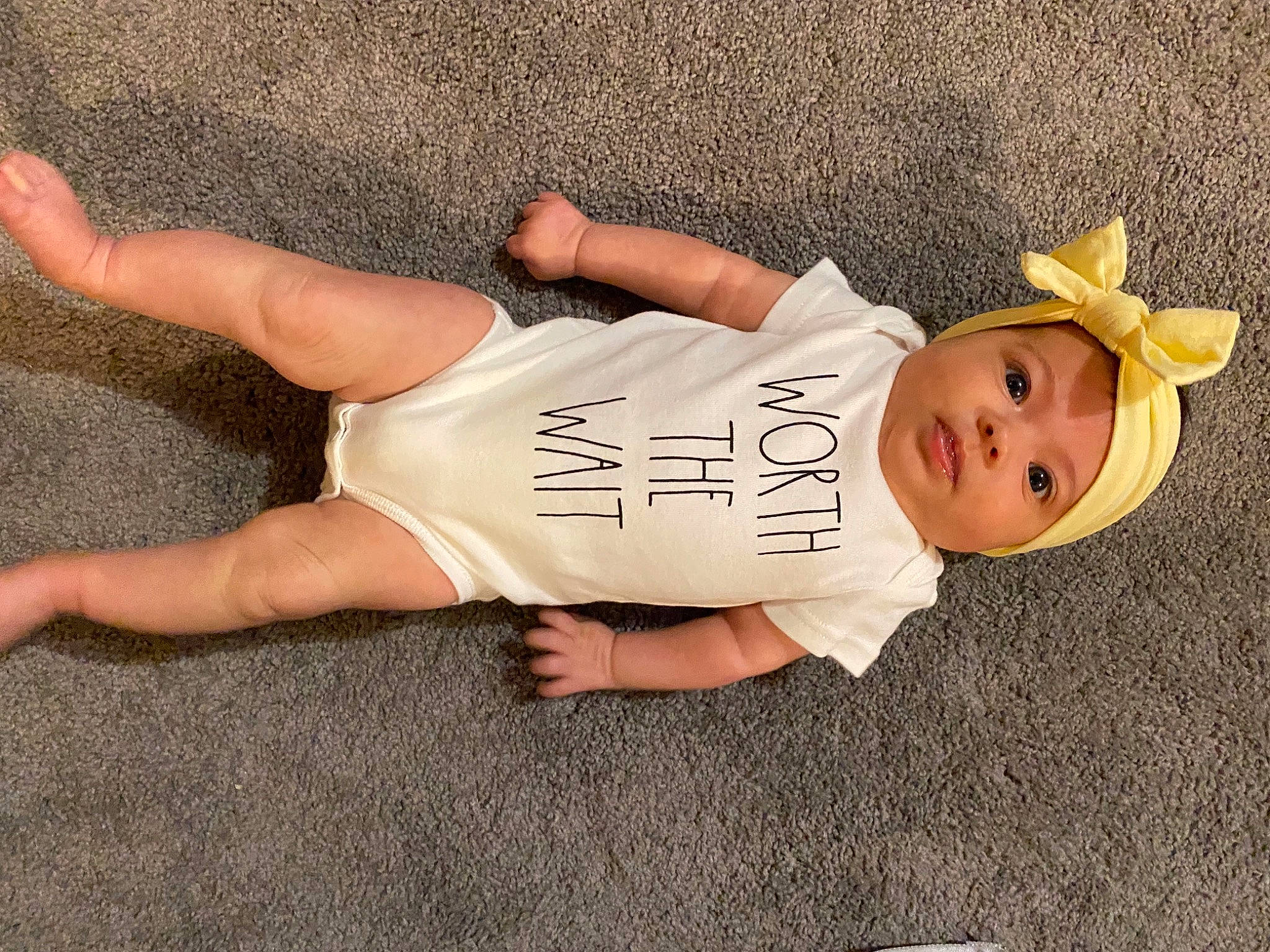 Esther joined the competition — help win amazing prizes! baby, baby_toddler_clothing, chest, elbow, finger, foot, fun, grass, happy, hat, headgear, headwear, human_leg, knee, person, sleeve, smile, thigh, toddler, trunk