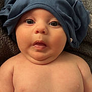 Forest joined the competition — help win amazing prizes! baby, infant, shirt, hat, blue_clothing, face, eyes, skin, expression, blanket, texture, mouth, chubby, arm, torso, cute, child, newborn, indoors, portrait