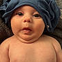 baby, infant, shirt, hat, blue_clothing, face, eyes, skin, expression, blanket, texture, mouth, chubby, arm, torso, cute, child, newborn, indoors, portrait