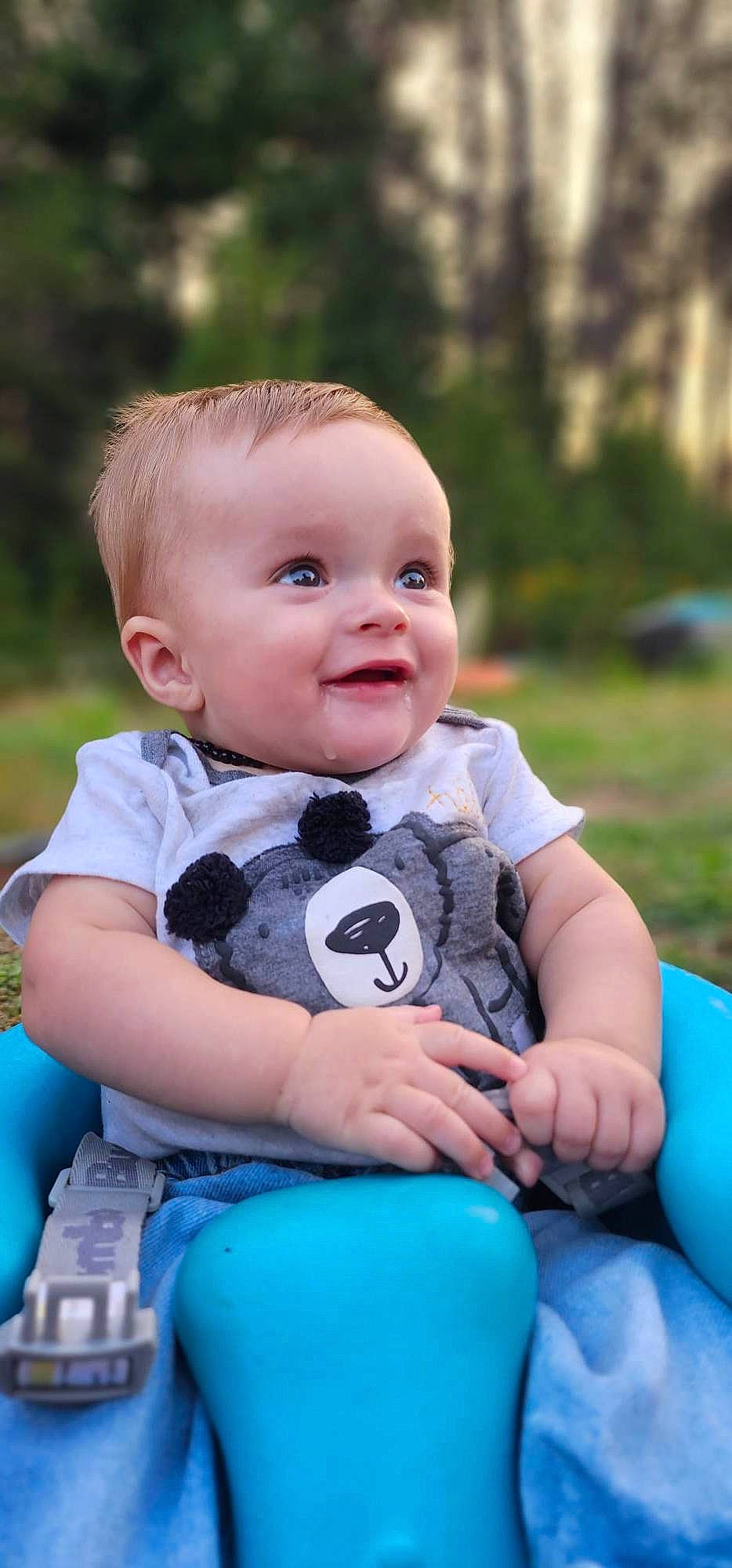 Kyler is registered to the contest to win money with this photo: baby, baby_playing_with_toys, baby_toddler_clothing, beauty, blue, facial_expression, flash_photography, fun, grass, happy, head, joy, leisure, people, people_in_nature, person, photograph, playing_with_kids, product, skin