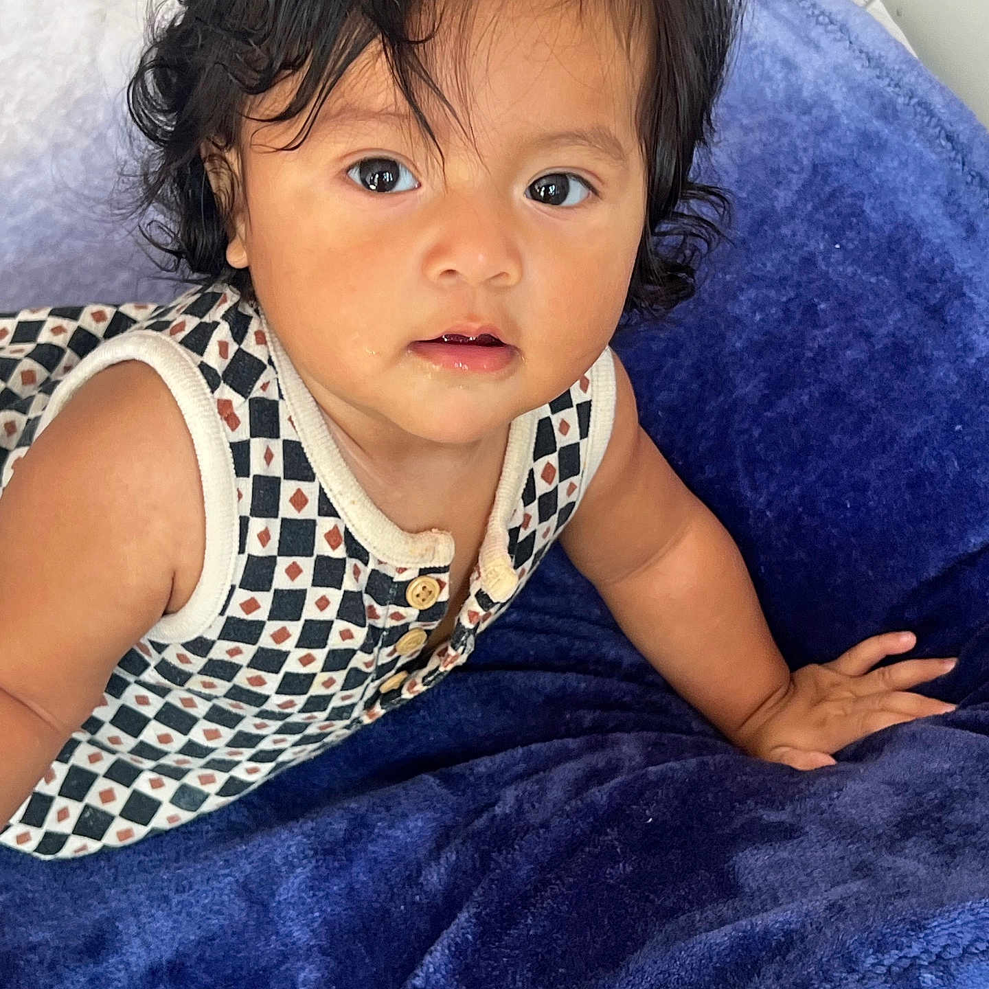 Zoemy joined the competition — help win amazing prizes! baby, blanket, blue_blanket, child, clothing, curly_hair, cute, expression, eyes, face, hair, hand, indoors, patterned_top, person, portrait, skin, sleeveless, toddler, young