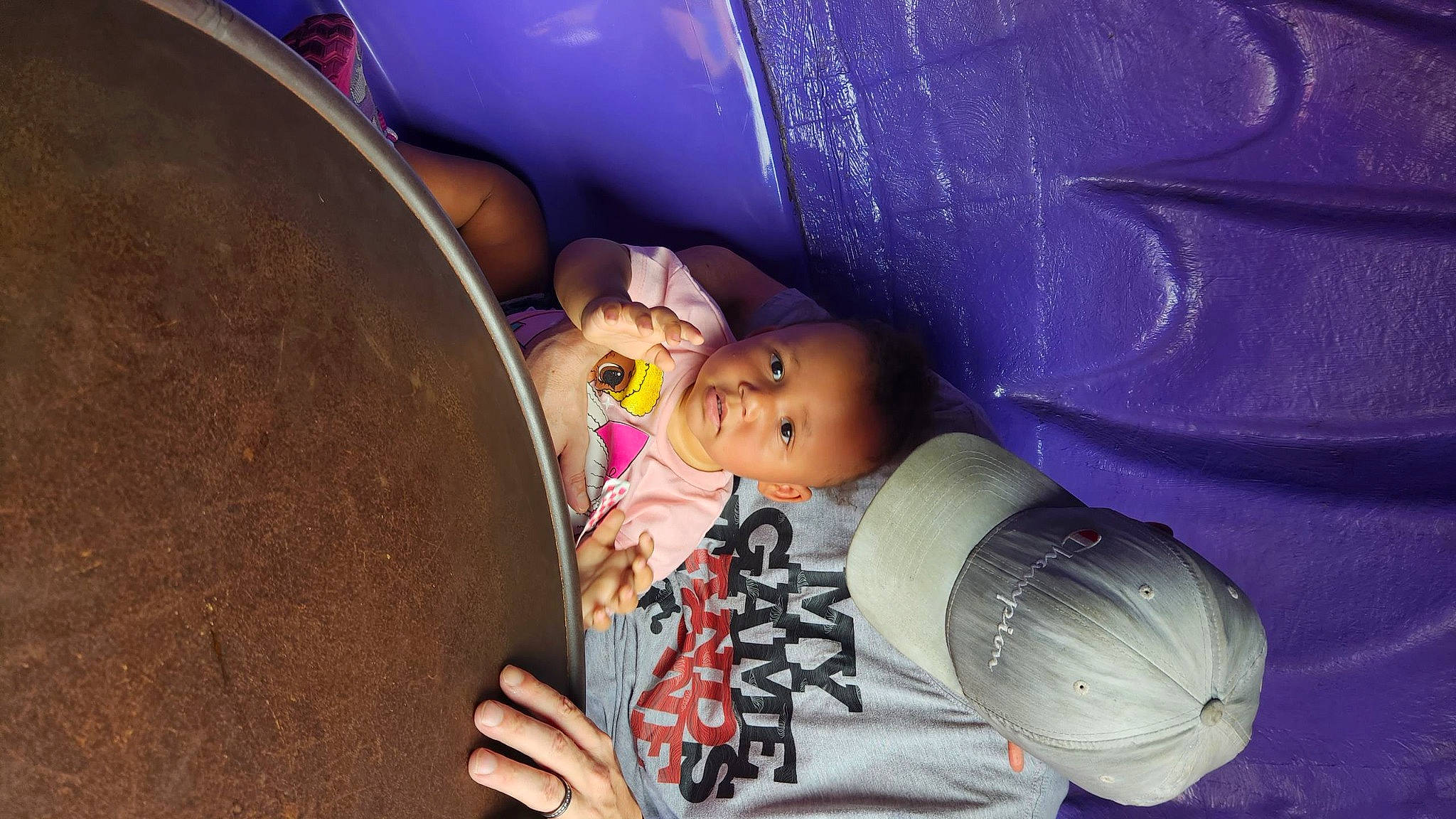 Charlotte joined the competition — help win amazing prizes! auto_part, baby, blue, child, electric_blue, fun, hat, leisure, person, plastic, purple, sitting, smile, toddler, tree, water