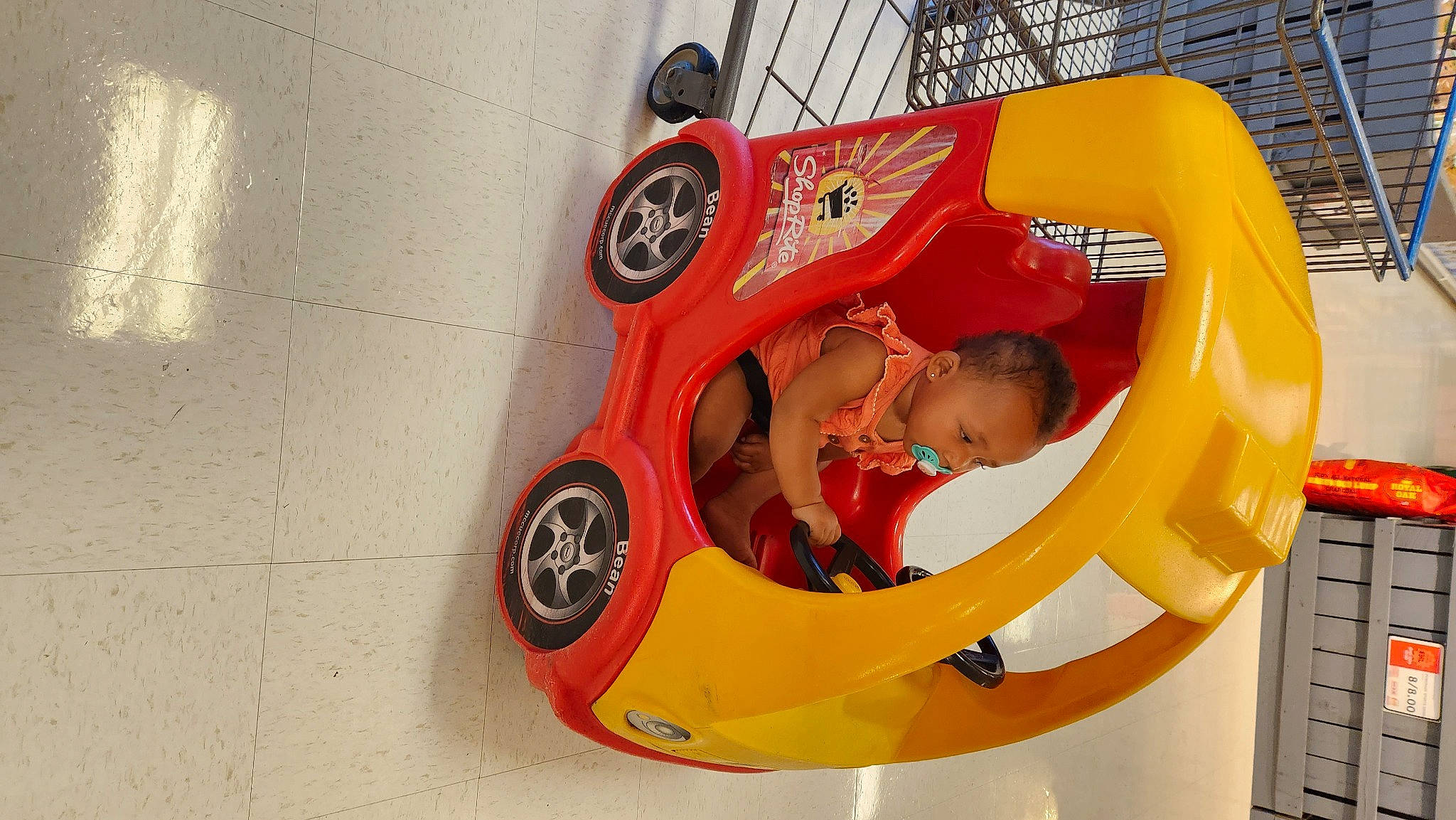 Charlotte is registered to the contest to win money with this photo: auto_part, automotive_design, automotive_exterior, automotive_tire, automotive_wheel_system, bumper, car, family_car, fender, fun, hood, leisure, motor_vehicle, person, recreation, rim, tire, toddler, vehicle, vehicle_door