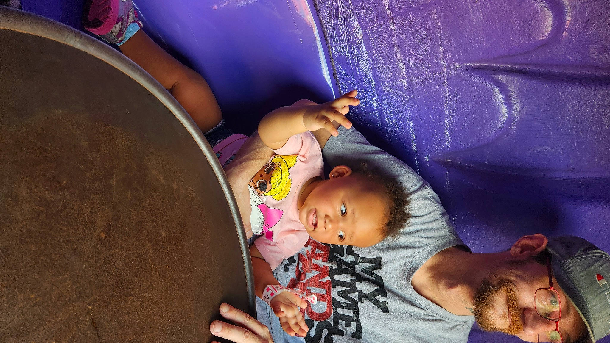 Charlotte is registered to the contest to win money with this photo: baby, baby_products, child, comfort, drum, elbow, fun, hand, happy, headwear, human, leg, leisure, magenta, people, person, purple, room, sitting, snapshot