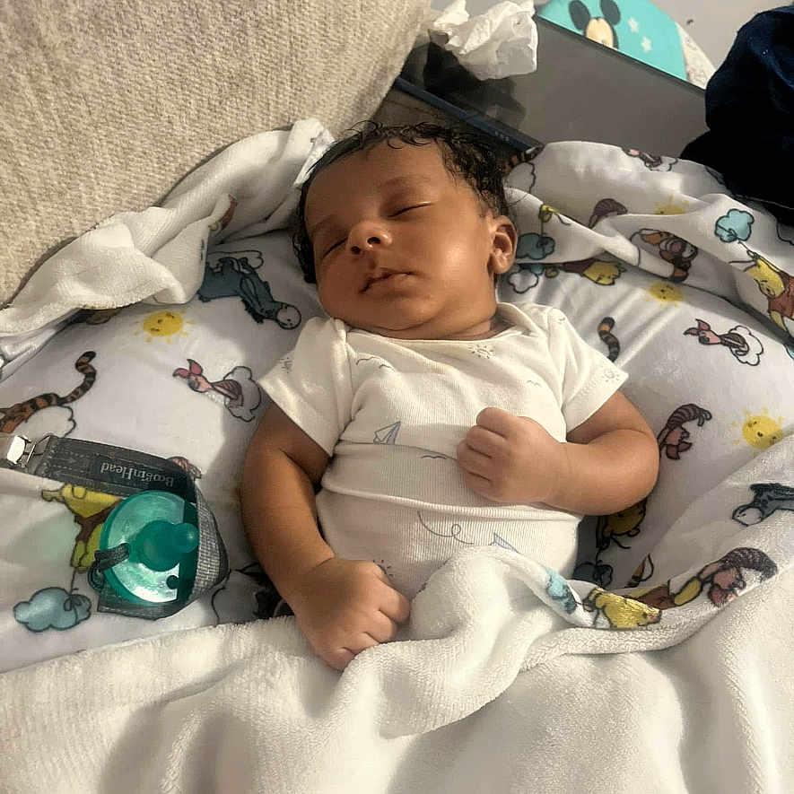 Baby Jr is registered to the contest to win money with this photo: architecture, baby, bed, bedroom, building, crib, cushion, face, furniture, head, homedecor, hospital, indoors, infantbed, newborn, person, photography, portrait, room, sleeping