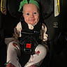 Valley joined the competition — help win amazing prizes! baby, child, car_seat, green_headband, pajamas, strawberry_pattern, smile, dimples, face, infant, seat_belt, sitting, happy, indoors, clothing, headwear, person, young_child, secure, cute