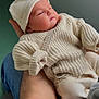 baby, infant, arm, knitwear, hat, sweater, person, indoor, window, light, skin, hand, cozy, sleepy, cute, child, warm, comfort, portrait, resting
