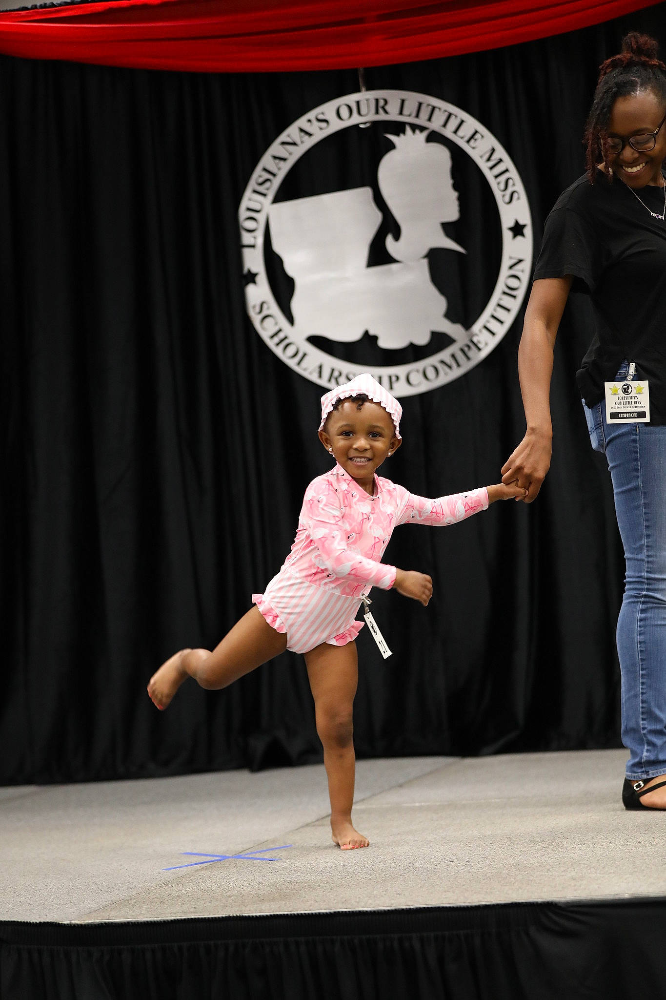 Novah joined the competition — help win amazing prizes! choreography, competition, competition_event, curtain, dancer, entertainment, event, fashion_design, headwear, human_leg, joy, logo, performance, performance_art, performing_arts, person, public_event, sports, stage, stage_equipment