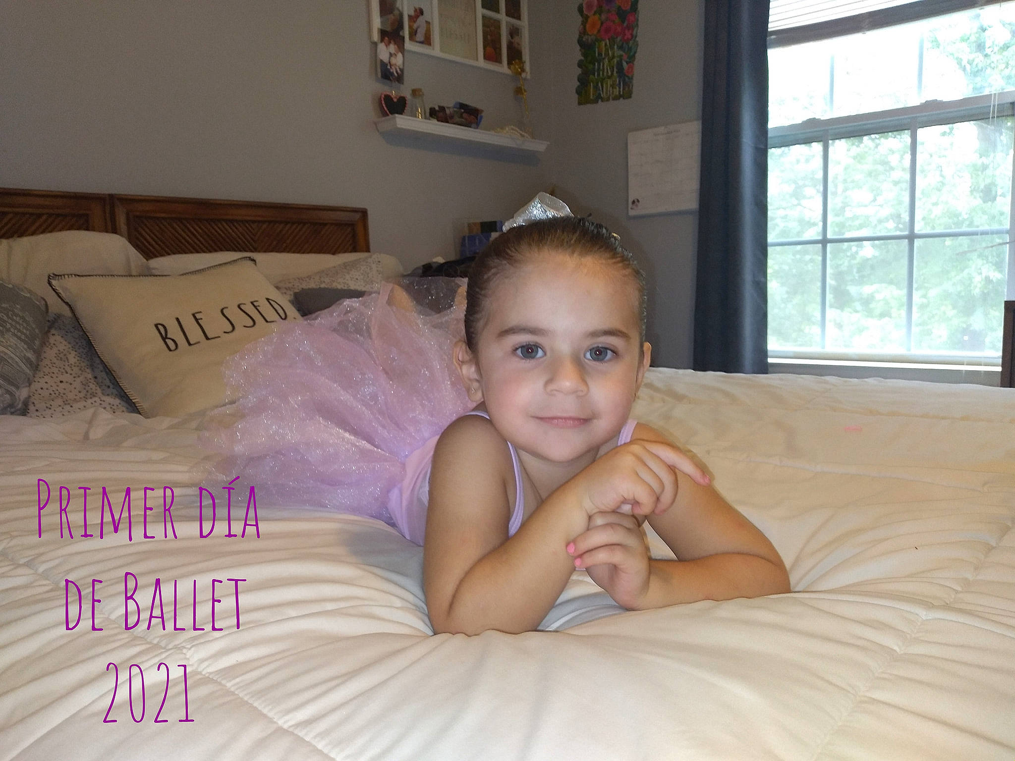 Isabella is registered to the contest to win money with this photo: bed, bedding, bedroom, child, comfort, couch, eyebrow, finger, floor, flooring, happy, iris, joy, linens, living_room, mammal, person, skin, smile, textile