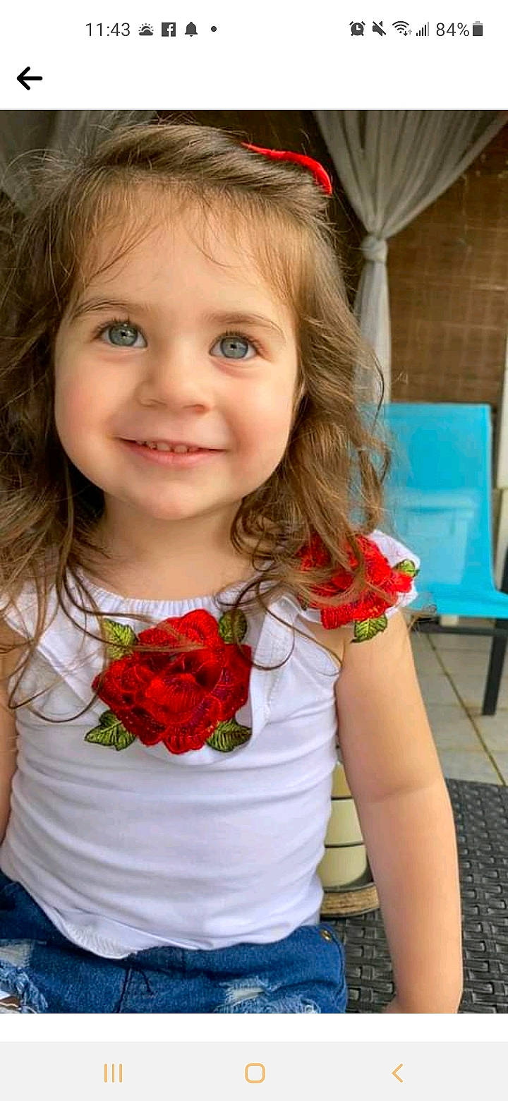 Isabella is registered to the contest to win money with this photo: beauty, blond, chin, clothing, eye, face, flower, happy, head, iris, jewellery, joy, lip, organ, person, petal, pink, red, skin, smile